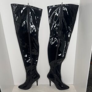 Pleaser Shiny Black Over-the-Knee Boots approximately 4.5 inch heel.